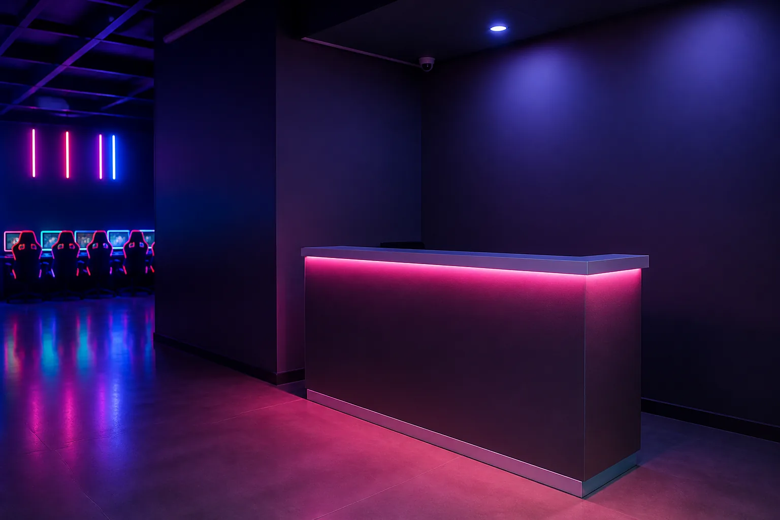 Recepción del salón gamer con luz neón magenta y cian
